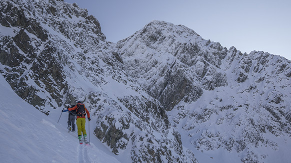 Couloir skiing at sunset