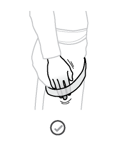 The user should be able to pass a flat hand between the thigh and the leg loop.