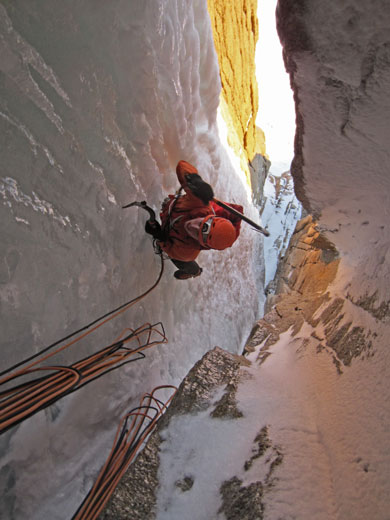 Petzl climber Martin Olslund following a fantastic pitch of steep ice on Tomahawk, during an integral ascent to the summit of Aguja Standhardt. Photo by Colin Haley.